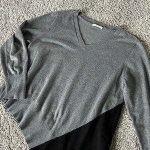 Asymmetric color block sweater